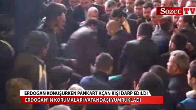 Erdoğan konuşurken bu pankartı açınca dayak yedi