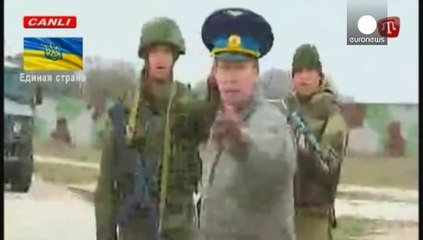 Tensions persist in Crimea as Ukrainian troops challenge Russians