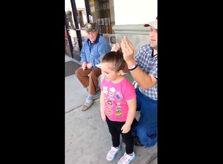 Dad makes perfect hair bun for daughter