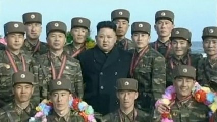 Rare footage of Kim Jong Un judging shooting contest