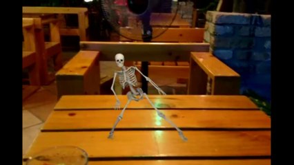 Skeleton is dancing on the table