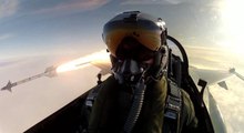 Air Force pilot fires a missile from F-16