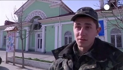 Shots fired in air in Crimea naval base confrontation - official