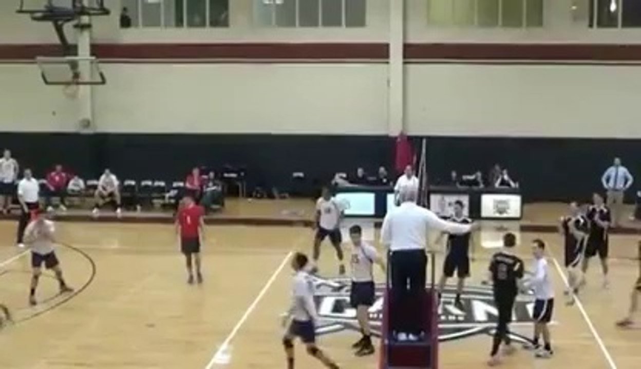 Violent headshot during volley-ball game!