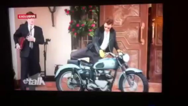 11.03.2014 Robert Pattinson and Dane DeHaan perched on a motorcycle and filming Life