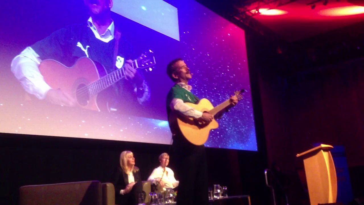 Astronaut Chris Hadfield Plays Fan's Guitar Onstage