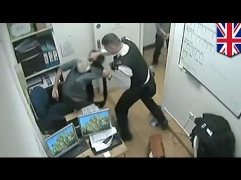 You're nicked! London policemen caught punching shoplifting suspect in the head