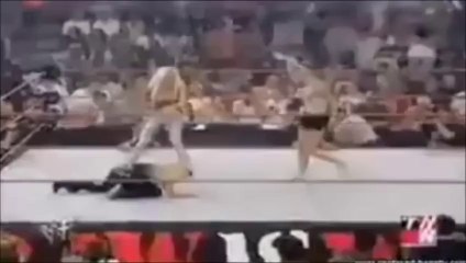 Lita saves Trish from Torrie and Stacy