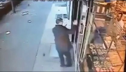 Download Video: Shop Door right in his face...Epic FAIL