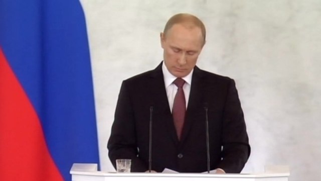 Putin, Crimean leaders sign treaty joining Crimea to Russia