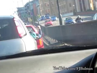Rock, paper, scissors while waiting in traffic