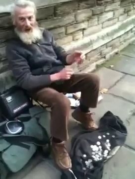 Dude playing the spoons to Insomnia by Faithless in Borough Market, London