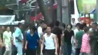 Han Chinese terrorists attack innocent Uighur man, Human rights abuse in China