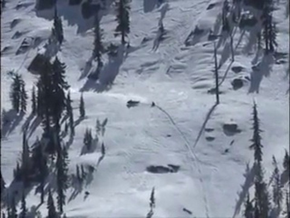 Crazy Snowmobile fail.... bye bye driver!