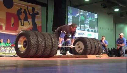 Strongest man of the world : 8 wheels (500 kg) !!!