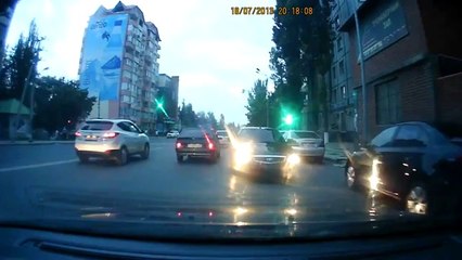 Crazy Driver Speeds Down Road In Reverse