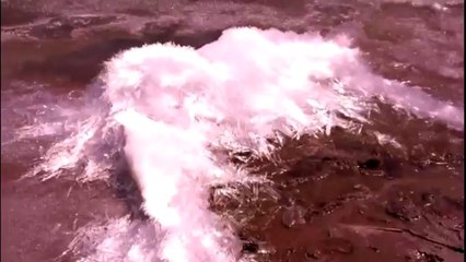 Ice Needles Flow Out of Lake