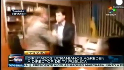 Diputados agreden a golpes al director de la TV pública ucraniana