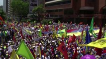 Thousands hit streets in new Venezuela protests, tear gas fired