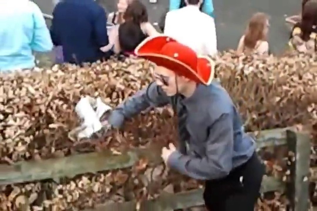 Drunk student trying to climb a fence... Hilarious!