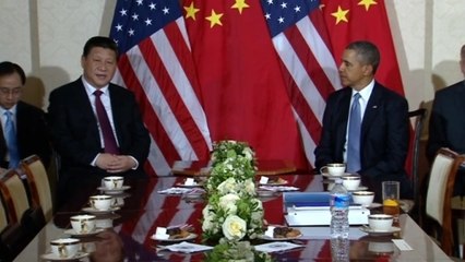 Obama, China's Xi pledge cooperation at nuclear summit