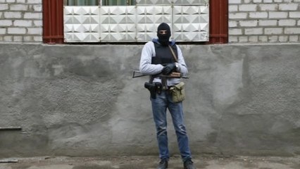 Armed men take over police station in Ukraine's Slaviansk