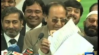 Ch Shujaat covers up as speech papers shuffle
