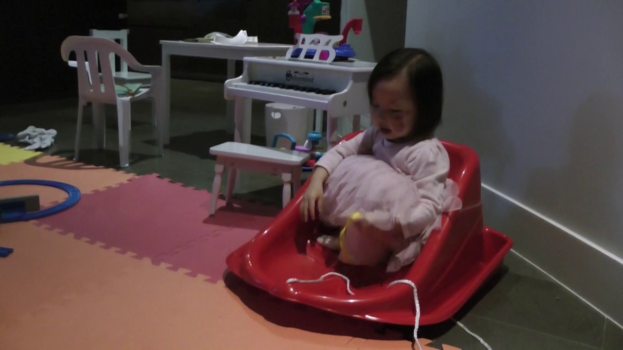 Girl Playing Sled