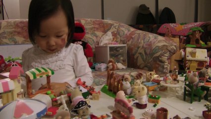 Girl And Sylvanian Families