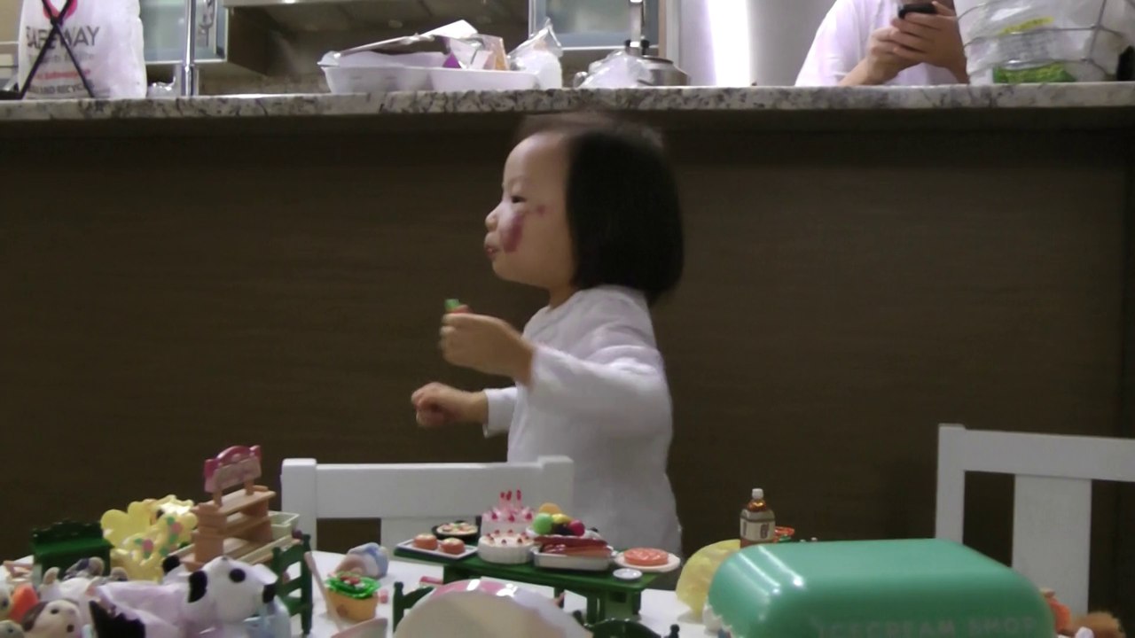 Girl Pretending Ice Cream Is Yummy