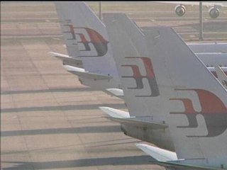 Vol MH370: comment les familles vont-elles pouvoir faire le deuil? - 25/03