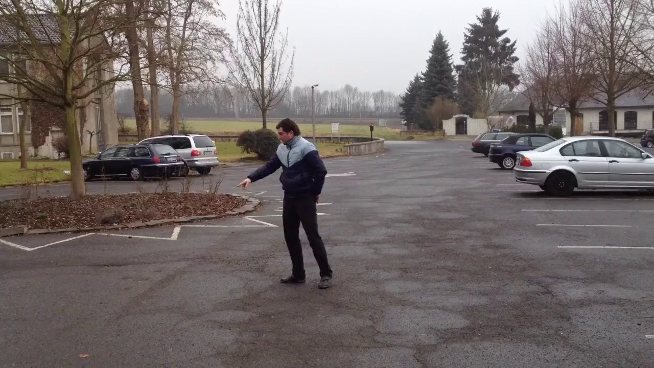 Almost killed by a car blown by wind