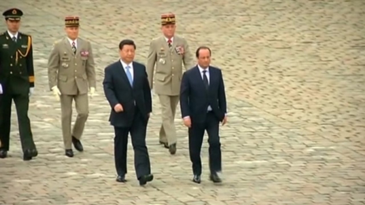 Paris welcomes China's President Xi Jinping with military honors