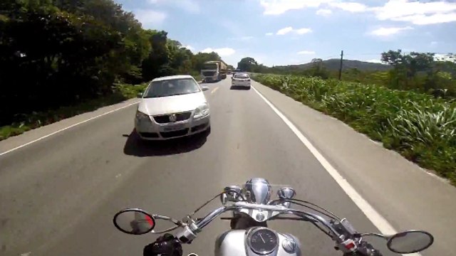 Crash of car Loses control on motorbike