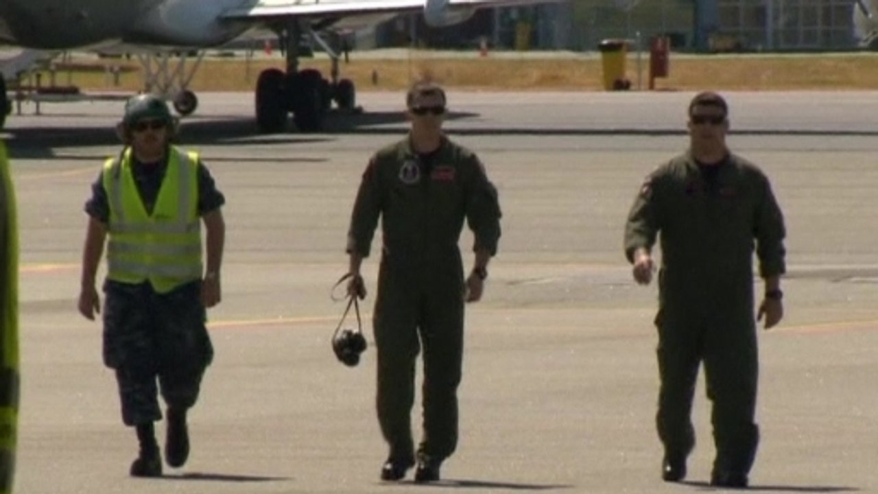 Bad weather again hampers plane search