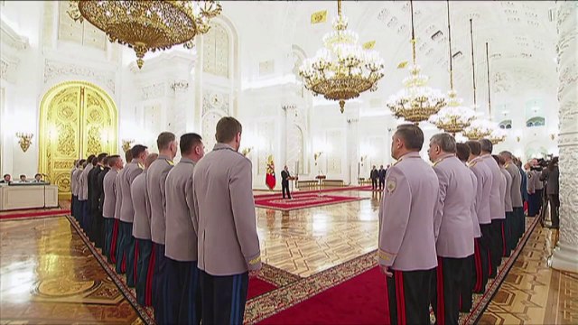 Putin praises Russian armed forces over Crimea takeover