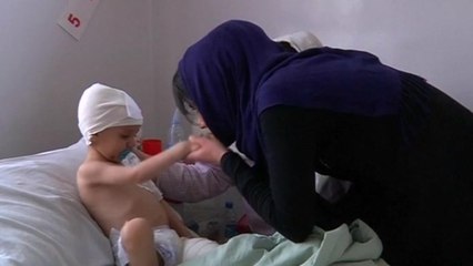 "What should tell him when he asks about his parents?"-aunt of wounded Afgan toddler