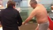 Drunk russian swimming with fish in a store!