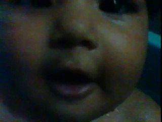 baby shiza first bath in tub