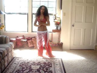 Learn to belly dance: spins with airplane arms