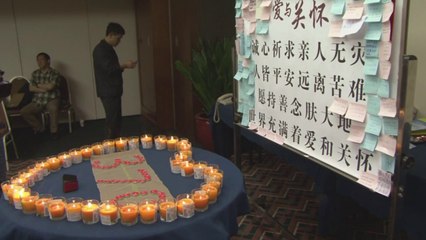 Flight MH370 families pray as airline offers little solace