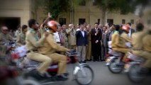 Provincial Chief Scout Dr Ishrat Ul Ebad Khan handed over 15 bikes to scouts participating in 'Payam e Amn' March