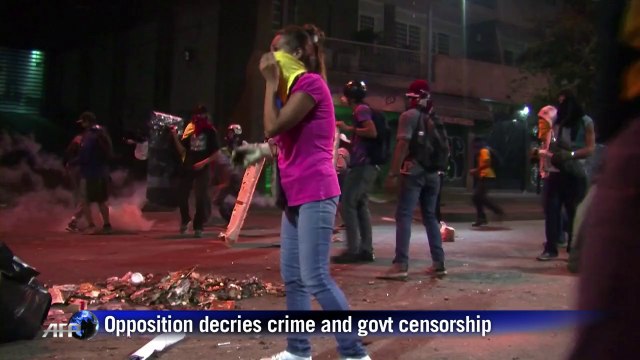 Protesters clash with Venezuelan security forces in Caracas