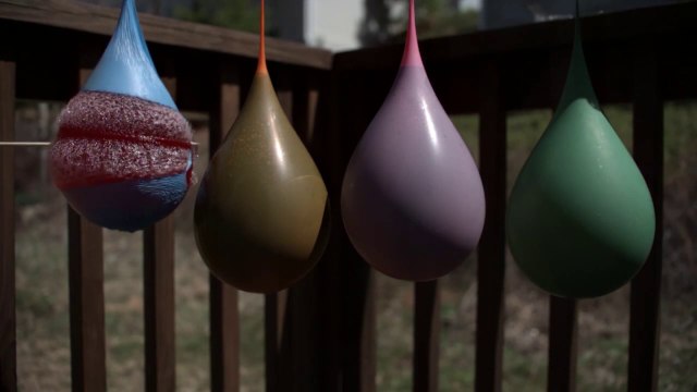 Water Balloons Busting In Super Slow Motion