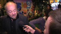Bill Bailey talks about funny ideas and does a scary Toucan noise at the Rio 2 Red carpet premiere.