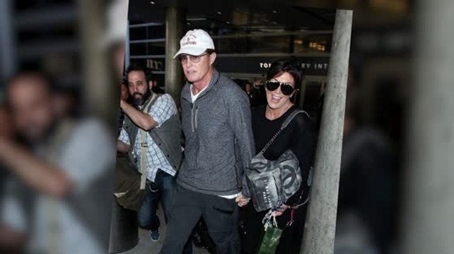Kris and Bruce Jenner Return From Thailand Holding Hands