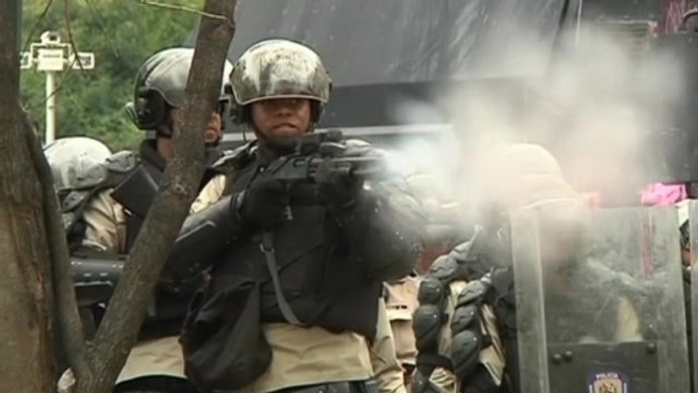 University students clash with riot police in Venezuela