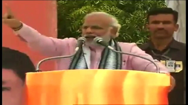 Modi urges Maoists to join mainstream, attacks Sonia