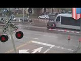 Caught on tape: SUV driver ignores rail crossing, gets a huge dose of reality