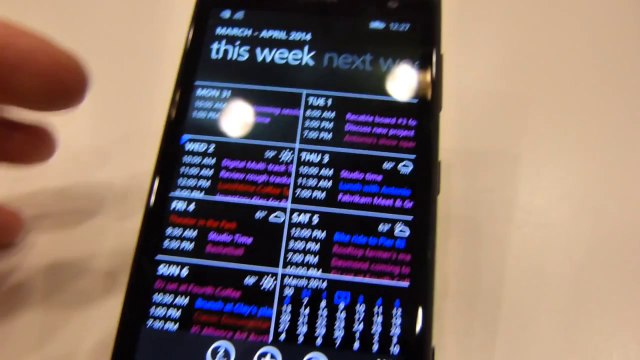 Video of action center, background images, and the new calendar on Windows Phone 8.1